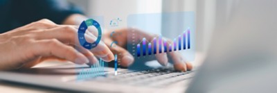 Hands at a keyboard in front of a screen, Trading Health Checks | DXC Technology